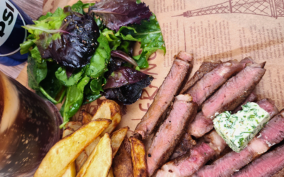 BONE-IN RIB EYE STEAK WITH HERB BUTTER